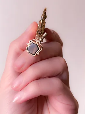 Delicious Onyx Watch Key in 9k