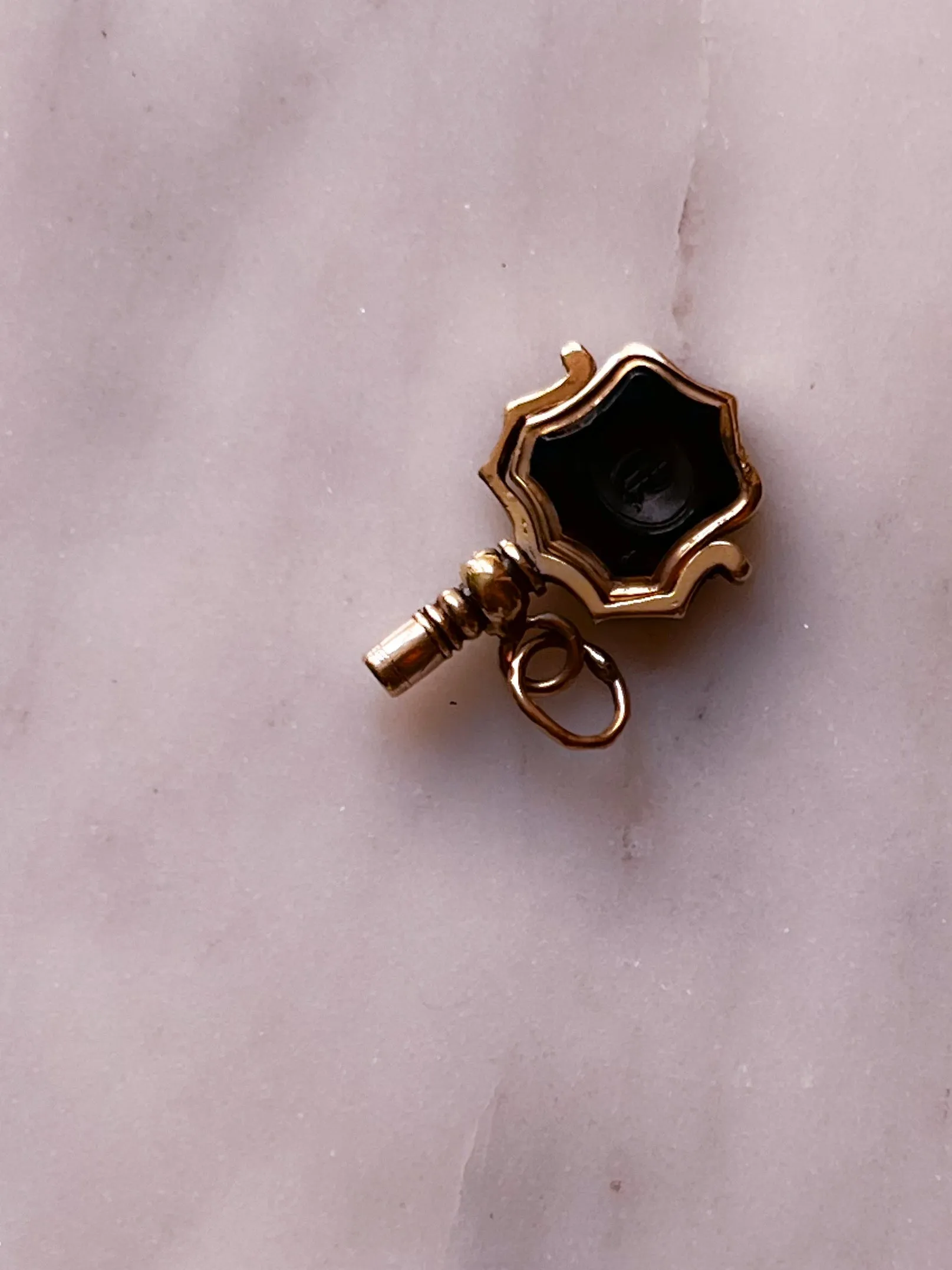 Delicious Onyx Watch Key in 9k
