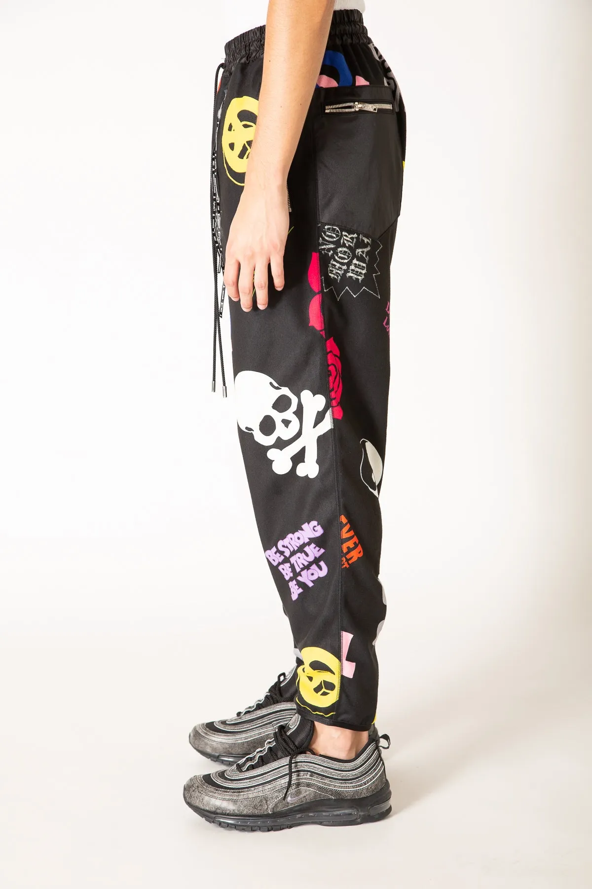 MASTERMIND | ALL OVER MOTIF TRACK PANTS