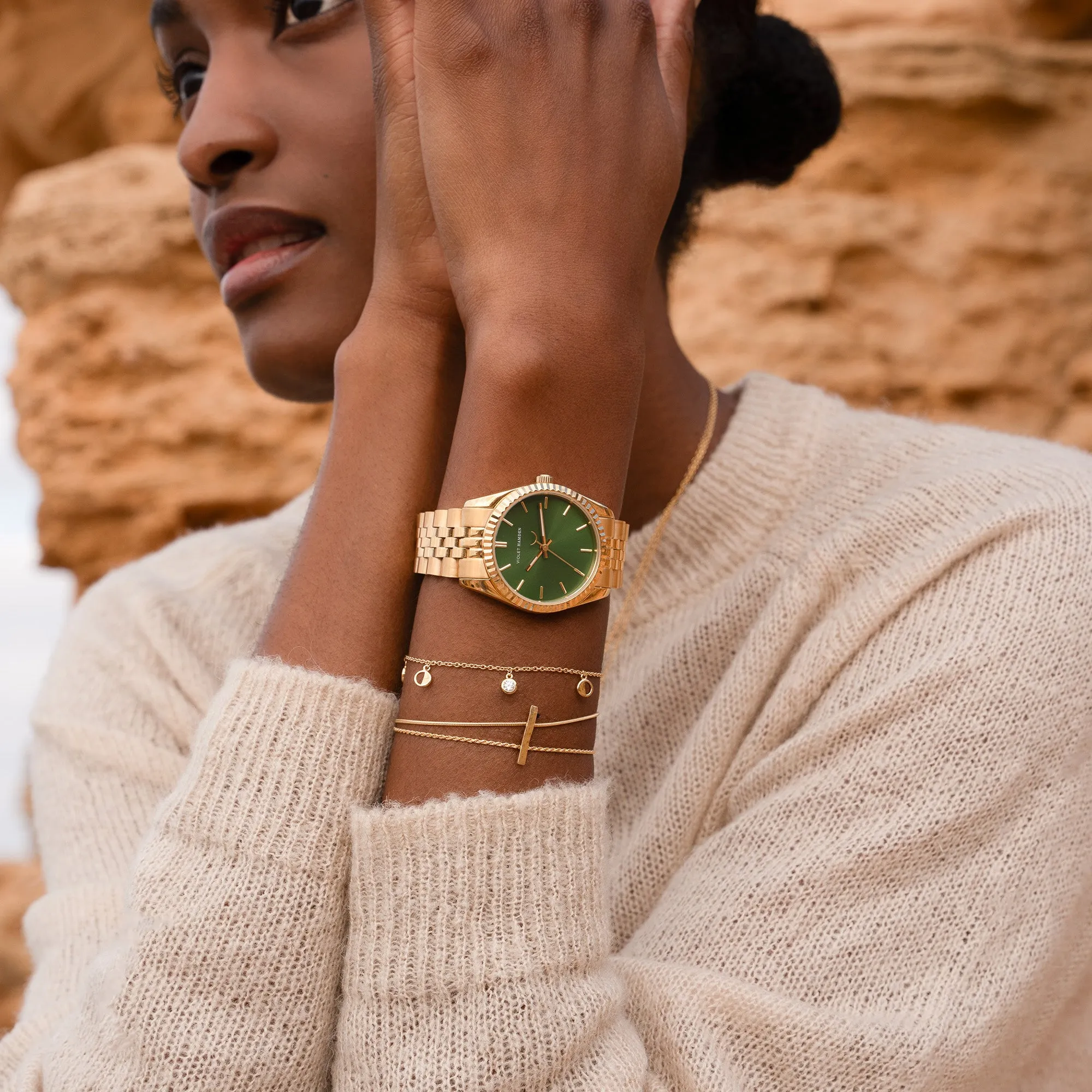 Sunrise round ladies watch gold coloured and green